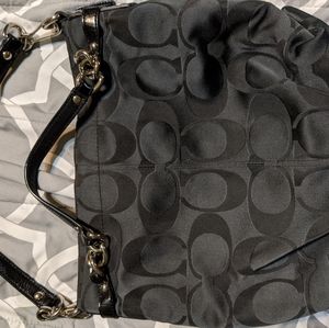 Black logo Coach purse